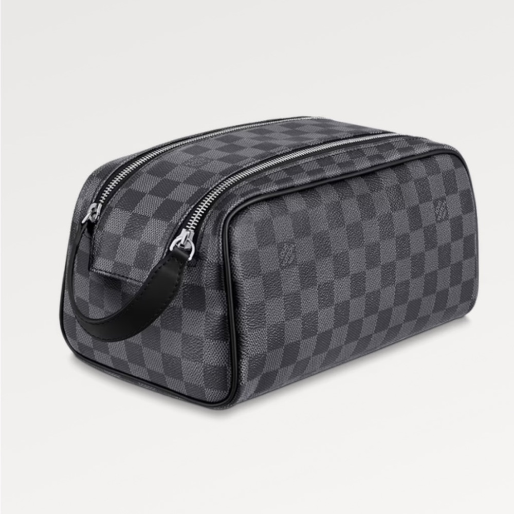 Louis Vuitton Dopp kit made from signature Damier Graphite canvas/leather trim.